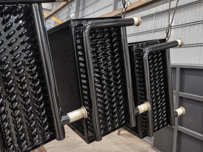 cured coils hanging with their connections capped