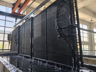 coated coils lifted from the dip tank