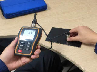 dry film thickness gauge reading on a coated test panel