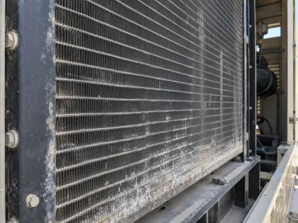 salt and dust deposits on a generator radiator core