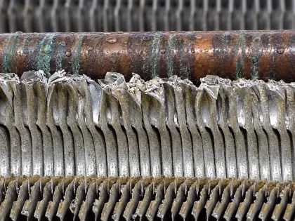 corroded fin collars on a heat pump coil