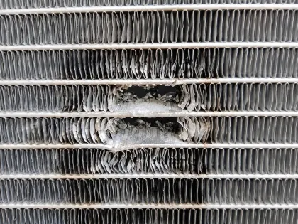 collapsed louvers on the air inlet face