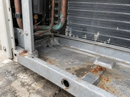 rusted base pan and fasteners